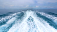 istock Boat wake on the blue ocean sea 494504329