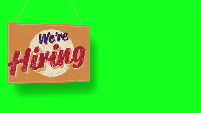 WE'RE HIRING Business sign drops on green screen and swings down with room for copy
