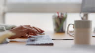istock Businesswoman hands typing on keyboard 1317816187