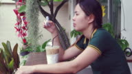 istock Cinemagraph : Asian Women Playing Fidget Spinner 826029588