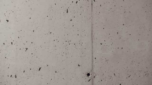 Concrete texture filmed in a minimalist interior, grey Texture, background