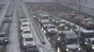 istock LD Congestion on the highway underpass in a snow storm 1136768160