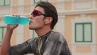 istock Cyclists drink energy drinks 1331140346