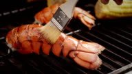 istock Delicious Lobster Tails and Sweetcorn on BBQ Grill 470793478