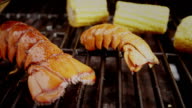 istock Delicious Lobster Tails and Sweetcorn on BBQ Grill 470794190