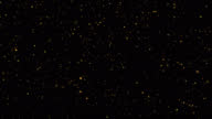 istock Falling golden glitter particles with alpha channel 4k 1393167057