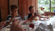 istock Family enjoying eating breakfast  together 1333694756
