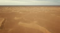 istock Flying over camping site in Sahara desert, Africa 1346344976