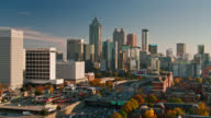 istock Freeway Traffic and Downtown Atlanta Skyline - Aerial 1365940942