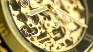istock Golden Watch Mechanism Working 1044620850