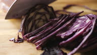 istock hand cut red cabbage on wooden chopping board 1378294902