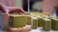 istock Handmade soap cutting in progress on table 1335689952