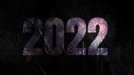 istock Happy New Year 2022 text appearing in the front of wonderful fireworks,Fireworks Display 2022 1341342533