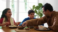 istock Indian Family Eating Meal At Home 1376364502