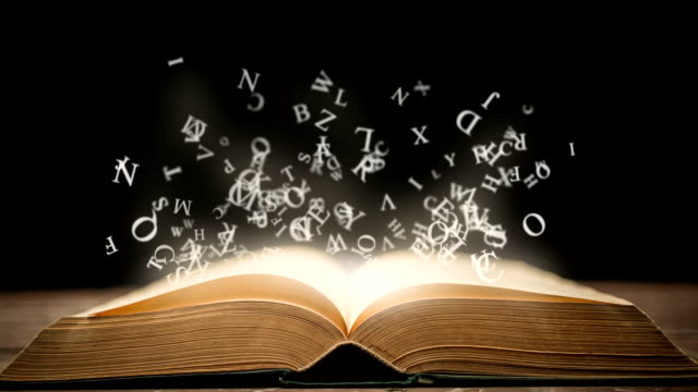 Magic book with animation glowing letters