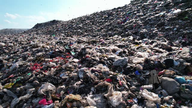Mountain large garbage pile and pollution,Pile of stink and toxic residu