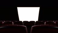 istock Moving Through the Dark Modern Cinema Hall Over the Seats to the Opening Screen. Beautiful 3d Animation with Green Screen. Art and Technology Concept. Curtains Opening. 1159445023