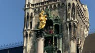 istock Munich, Germany. Famous Marian Column in front of New City Hall at Mary's public square. Carillon music. Video with sound 1357873133
