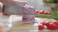 istock Professional Cook Rapidly Chopping Onion, Close-Up 1346300992