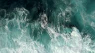 istock Real time shot of sea surf. Aerial top down view 946257202