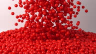 istock Red balls falling Three dimensional 1344790438