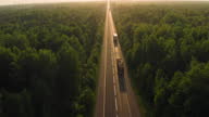 istock Road transport truck industry forest nature highway car delivery 1325712872