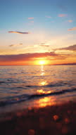 istock Sea sunset and ripple waves 1324777173