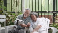 istock Senior couple travel on urban street. 1413752938