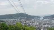 istock Senkoji Temple Mountain Ropeway ascends. In the background Onomichi city 1401321527