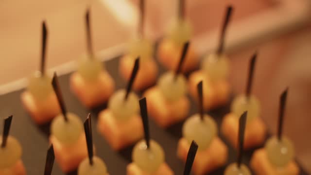 Snacks with cheese and grape, close-up. Party buffet