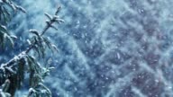 istock Snow covered spruce tree in snowfall 908884142