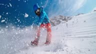 istock SPEED RAMP Snowboarder cutting through fresh snow in sunshine 1139847635