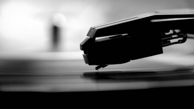 Stylus and record turntable. Monochrome.