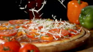 istock HD Super Slow-Mo: Adding A Sprinkle Of Cheese On Pizza 180617222