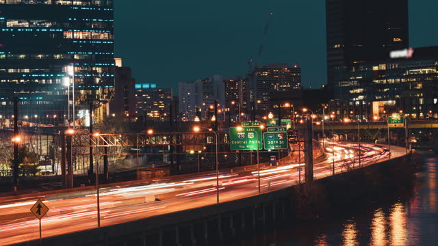 Time lapse of Philadelphia City with traffic light at nighttime, USA