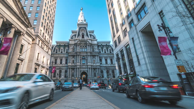 Time lapse of Philadelphia's landmark historic City Hall and car traffic in Pennsylvania, United States