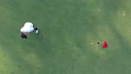 istock Top view of asian male golf player failed strike on the golf course. Fail, failure, bad day concept. 1305258623