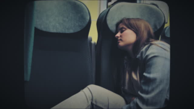 Tourist woman sleeping on the train