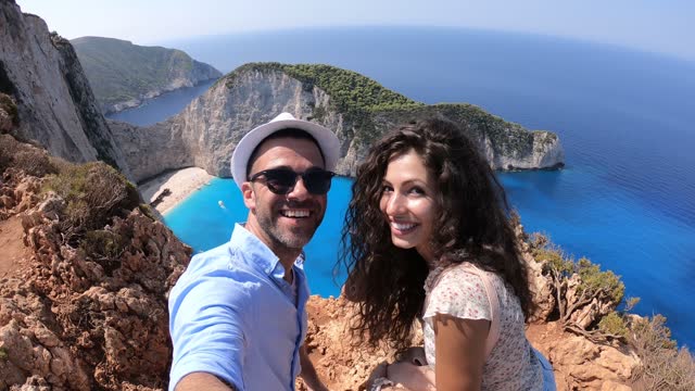 4K Video Couple holding hands and looking to Zakynthos