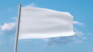 istock White flag waving. Luma matte provided so you can put your own background. 1179185190