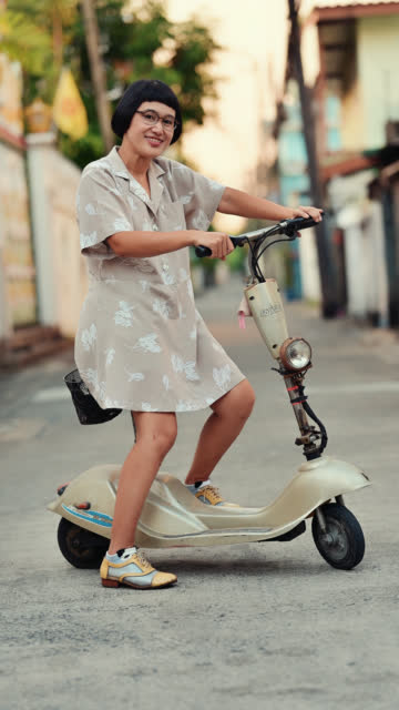 Woman ride electric scooter